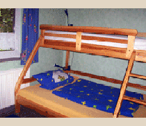 Das Schlafzimmer in der Ferienwohnung Sonnengarten auf dem Ferienhof Epker im Münsterland